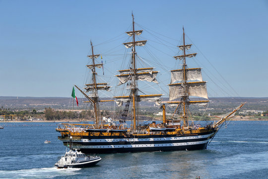 The Amerigo Vespucci training ship of the Italian Navy crosses the navigable canal of Taranto, Puglia, Italy