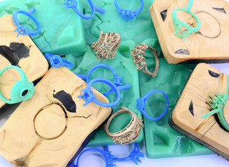 Silica rubber molds, silver molds, many green and blue wax rings, used in the manufacture of...