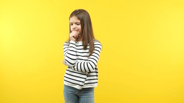 Funny little child girl thinking about an idea