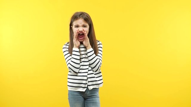 Funny little child girl shouting happy