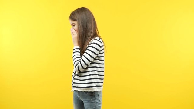 Funny little child girl whispering gossip undertone
