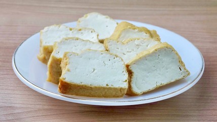 Golden Brown Deep Fried Tofu on White Dish