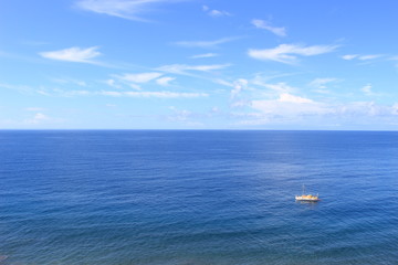 Fototapeta na wymiar boat on the atlantic ocean