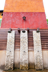head shower water stream at swimming pool