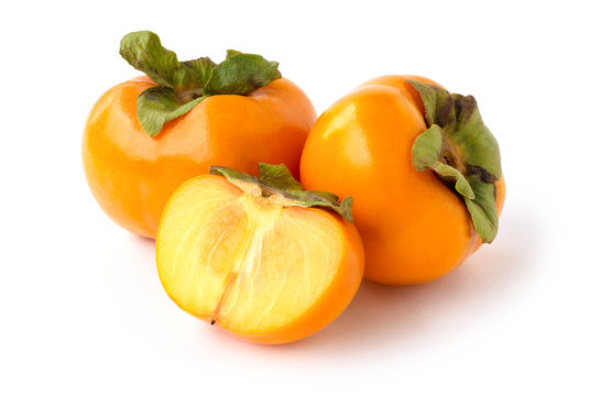 Persimmon fruit on white