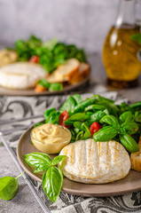 Grilled camembert with delicious salad