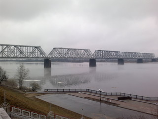bridge over the river in fog
