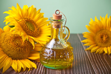 Sunflower oil in a bottle on the wooden table