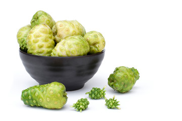 Morinda citrifolia or Noni frui on white.