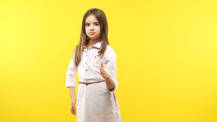 Funny little child girl reaching out to greet someone - Powered by Adobe