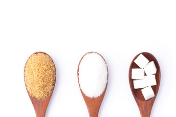 Closeup brown and white sugar in wooden spoon isolated on white background. Unhealthy eating ,awareness and stop diabetes concept. Top view. Flat lay.
