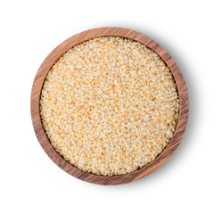 White sesame seeds in wooden bowl isolated on white background with clipping path. Healthy eating concept. Top view. Flat lay.