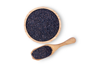 Closeup black sesame seeds in wooden bowl and spoon isolated on white background. Healthy eating concept. Top view. Flat lay.