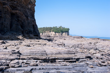 Beautiful rock and bolders on the seashore along the coastline.