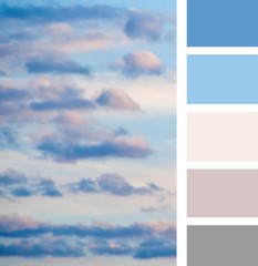 Abstract blurred shapes of pink colored clouds. Soft and delicate shades of light blue and pink colors in the sky. Color palette swatches, combination of colors.