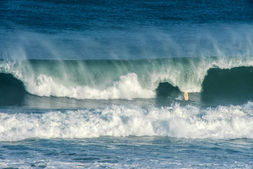 surfer in big waves