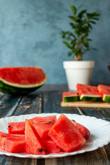 Pieces of watermelon in a plate close-up.