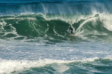 surfer in big waves