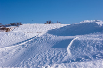 Fototapeta na wymiar Beautiful pure snowscape,winter in the mountainside outdoor.