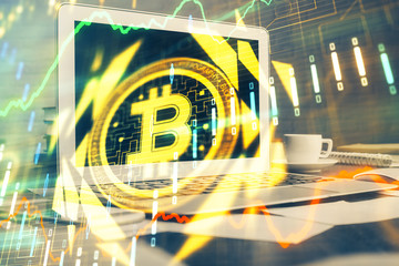 Multi exposure of blockchain theme hologram and table with computer background. Concept of bitcoin...