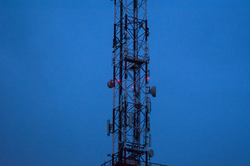 Telecommunication pole at dusk