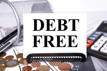 debt free. text on white paper on the background of financial graphs money