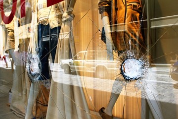 Greece, Athens, June 28 2020 - Broken glass of store window at Ermou street, in the commercial center of Athens, after vandalism made by anarchists.