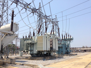 High voltage power transformer in switchyard and electrical power substation - obrazy, fototapety, plakaty