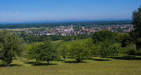 Fototapeta na wymiar View from Fremersberg to the town of Sinzheim with the Rhine valley near Baden Baden. Baden Wuerttemberg, Germany