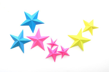 Colorful paper stars on white