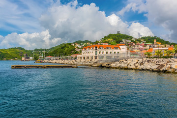 A view of the waterfront in St Georges in Grenada - obrazy, fototapety, plakaty