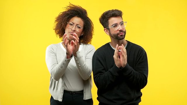 young black woman and caucasian man devising a plan