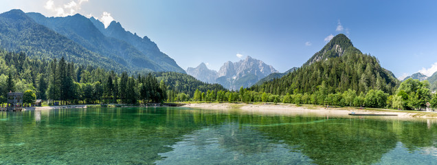 Stunning panorama view over Lake Jasna, Kranjska Gora, Slovenia, with the Alps in the background