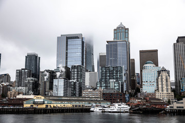 Fototapeta na wymiar Seattle harbor and skyline on a rainy day
