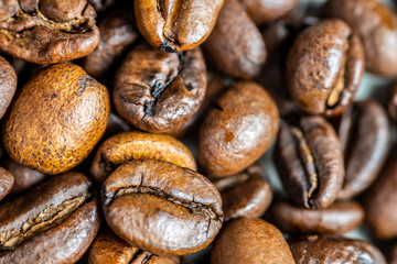 Macro shot of whole bean organic smooth medium dark roast coffee