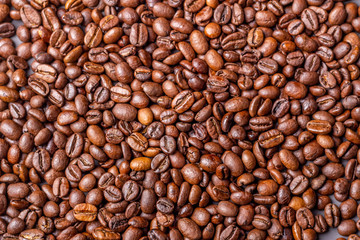 Macro shot of whole bean organic smooth medium dark roast coffee