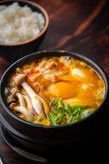 Sundubu, korean hot stone pot with tofu and pork