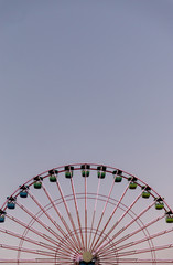 A ferris wheel at sunset
