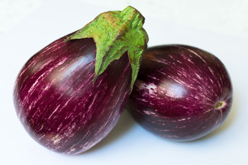 Two eggplants isolated on a white background.
Close-up.