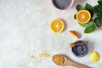 Spa, blue clay, aromatic oil, orange on the table, top view, cleanliness and hygiene concept, ingredients for mask, scrub, natural home cosmetics, healthy lifestyle
