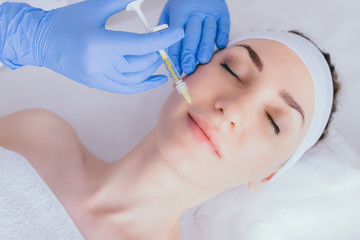 Hyaluronic acid injection in lips.Cosmetology.Cosmetic procedures, injections, botox, hyaluronic...