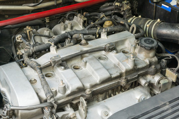 Old engine without spark plug and Ignition coil, Car maintenance service.