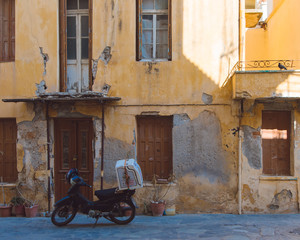 scooter on old street in chaia, creete