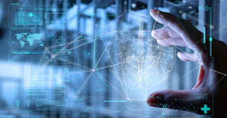 Close up of  Doctor hand analyzing patient brain with human anatomy on technological digital tablet futuristic Ui and digital holographic innovative with science and medicine concept.