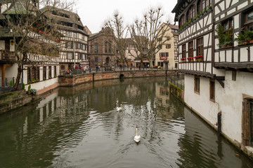 Fototapeta na wymiar Canal and old houses of Petit France medieval district of Strasbourg, France