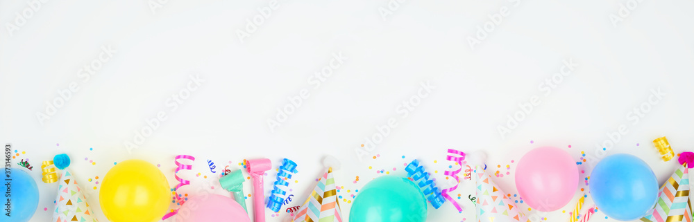 Poster birthday party banner with bottom border on a white background. top down view with balloons, party h