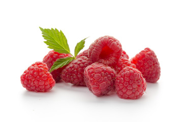  raspberries with leaf isolated on a white background