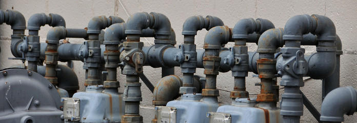 close up of a row of gas pipes in a row