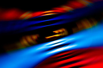 Abstract colorful lines on black background