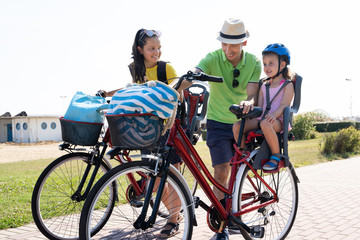 Family Riding Bicycle Outside